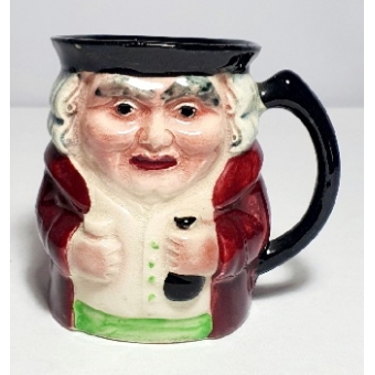 Toby Jug. Staffordshire. Known as Man holding money